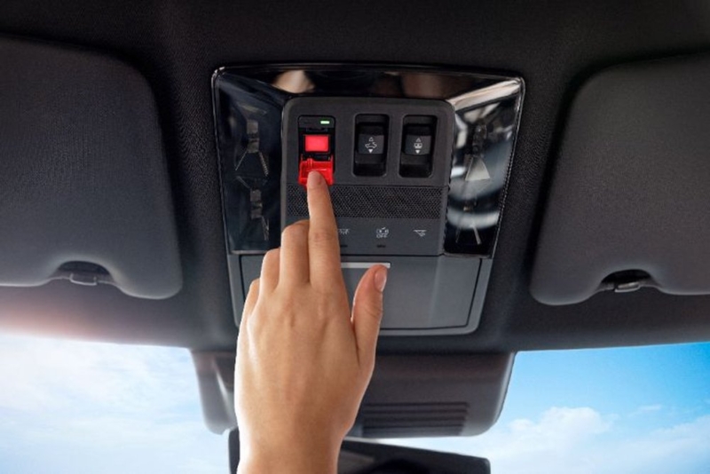 Mitsubishi 2025 Outlander interior showcasing the SOS button, part of Intelematics-powered eCall services including Automatic Crash Notification (ACN) in Australia.
